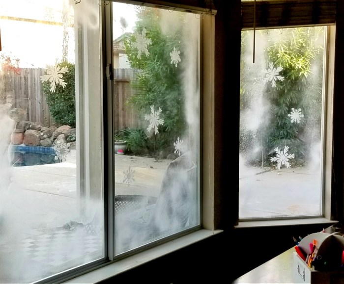 How to decorate a window with snow spray